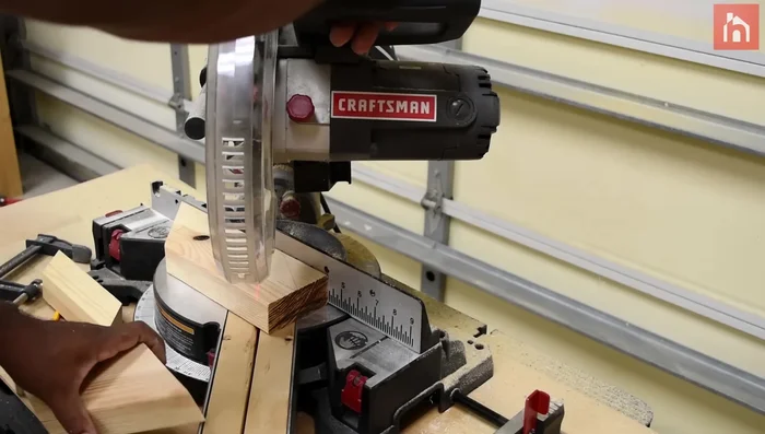 Sand the legs and apply a coat of clear polyurethane.