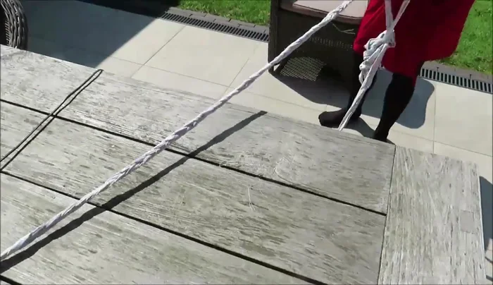 Continue braiding until finished and secure the end with an elastic band.