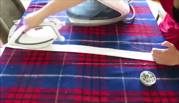 Fold the straps right sides together, sew, and turn them right side out. (Optional, but recommended for a neater finish).