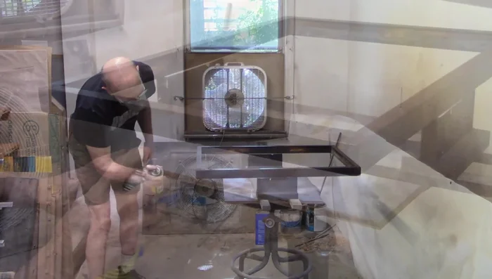 Spray with aerosol shellac to build up the finish.