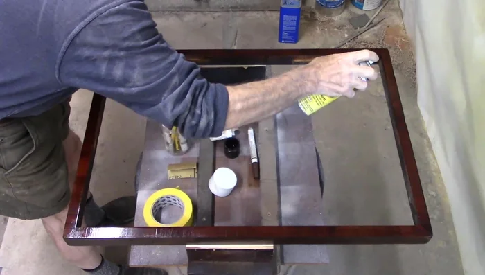 Apply a final coat of aerosol shellac.