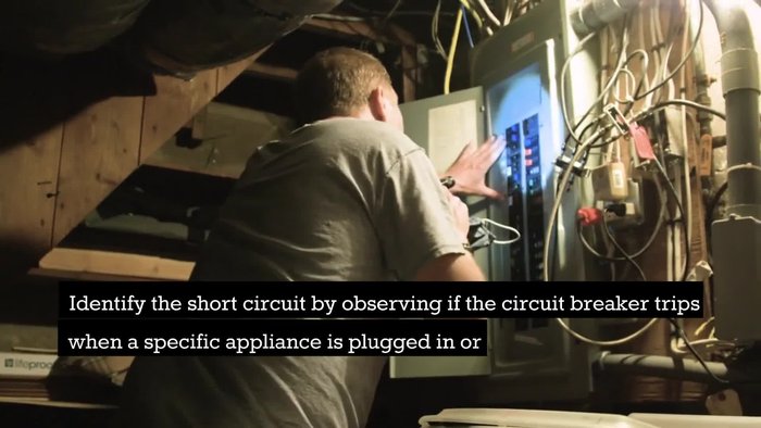 Identify the short circuit by observing if the circuit breaker trips when a specific appliance is plugged in or if it trips even without any appliance connected.