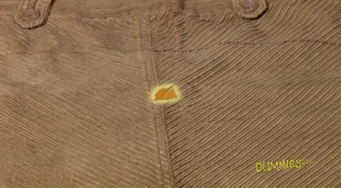 Work around stains and snags. If necessary, incorporate tears or stains creatively with patches or contrasting colors.