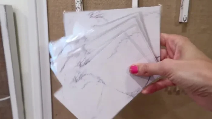 Create reusable chore lists and money tracking systems using laminated notepads.