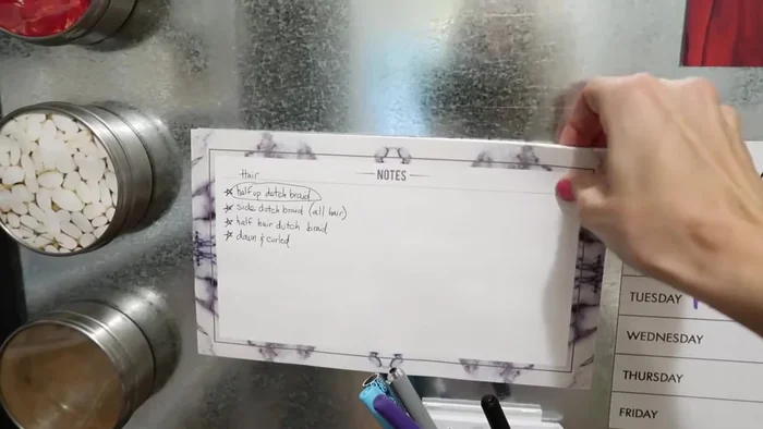 Add a menu planner and lunchbox idea area using magnet strips and notepads.