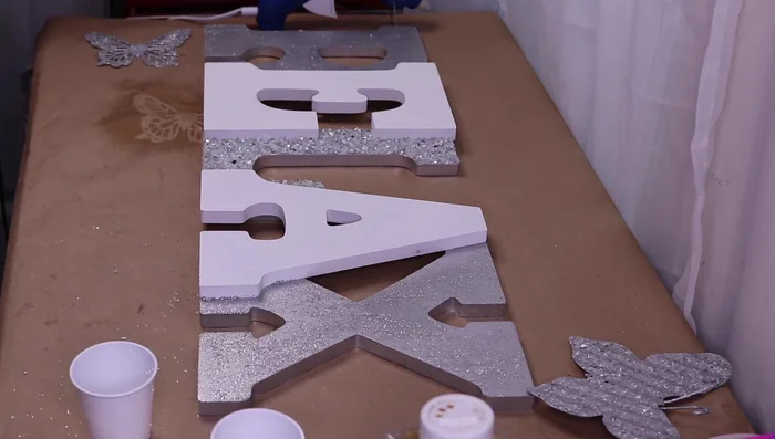 Add additional bling to the sides of the letters using Fix All glue.