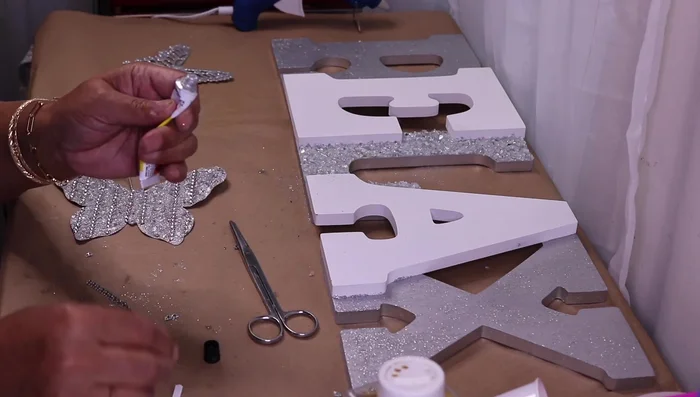 Add additional bling to the sides of the letters using Fix All glue.