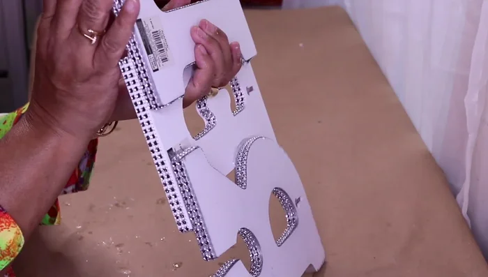 Add additional bling to the sides of the letters using Fix All glue.