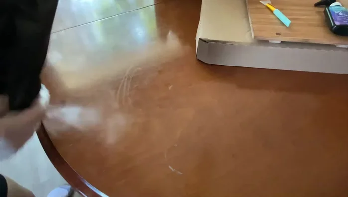 Spread the resin evenly using a silicone brush and fingers.