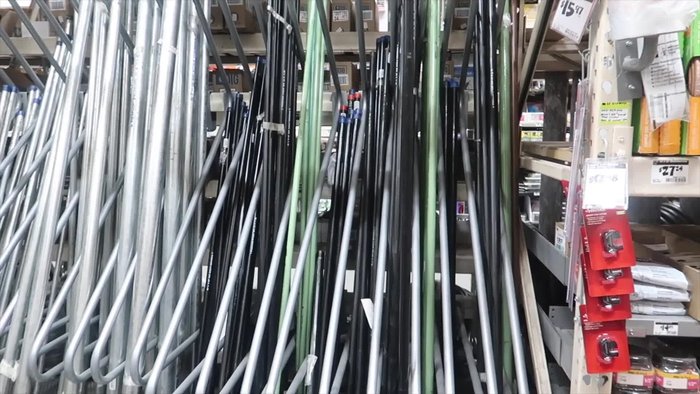 Drill holes in the wall bracket to accommodate the curtain rod.