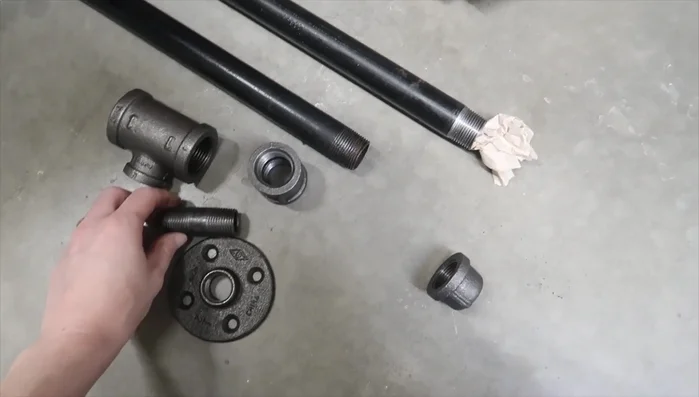 Cut the curtain rod into multiple pieces (for easier handling).