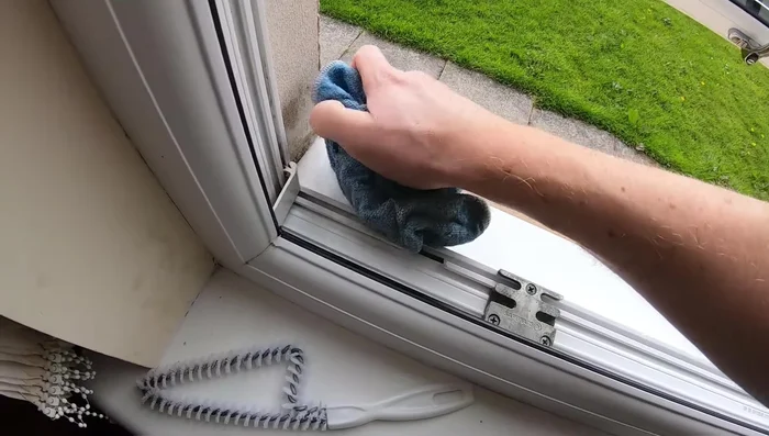 Clean the exterior sill to remove any remaining debris.