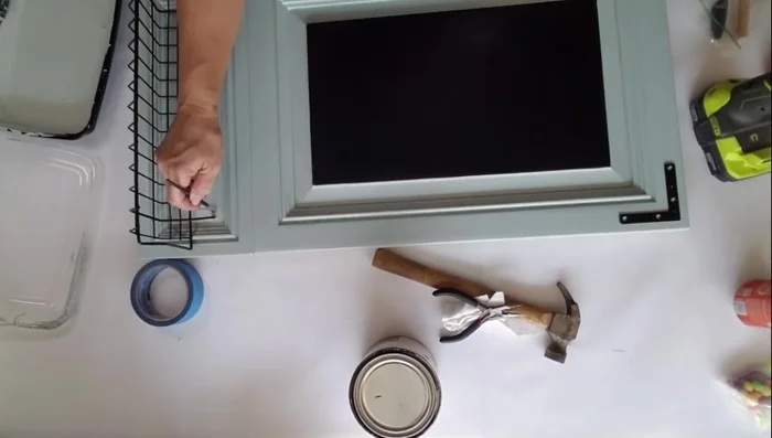 Touch up any paint that was removed during drilling.