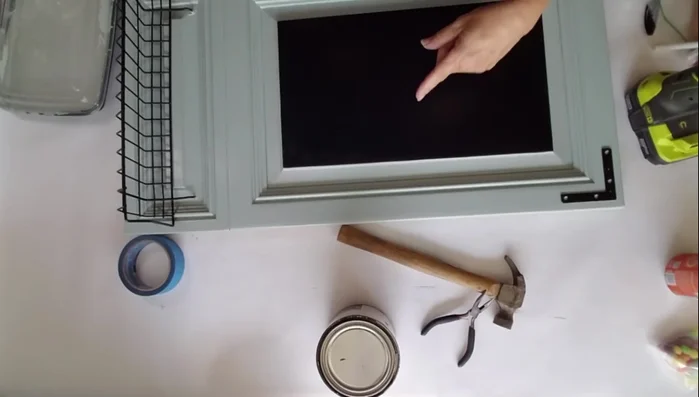 Prep the chalkboard surface: Cover the entire surface with chalk, then buff it in with a paper towel or eraser to cure the board.