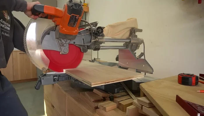 Build the Side Rails: Rip plywood into 13-inch wide strips. Cut to length. Trace and cut out drawer openings. Reuse cut-out sections as drawer fronts. Attach 1x3 trim along the top, bottom, sides, and middle.