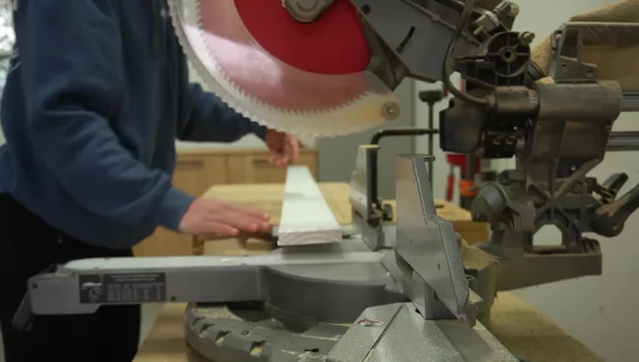 Install Bed Slats: Cut 1x4s (or plywood strips) to length. Attach 2x2 supports to the center of each slat to prevent sagging. Install slats onto the side rails.