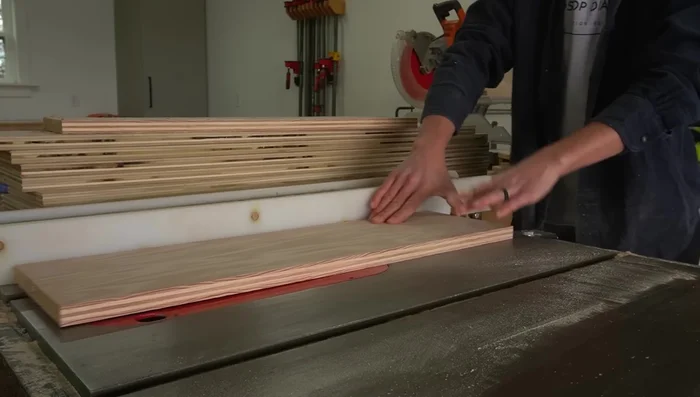 Construct Drawer Boxes: Cut 3/4 inch plywood for drawer box sides. Cut dados for plywood bottoms. Assemble boxes using pocket holes. Install drawer slides.