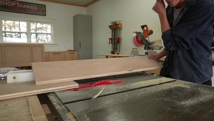 Create and Install Drawer Fronts: Straighten and trim drawer fronts (pieces cut from side rails). Apply iron-on edge banding. Attach drawer fronts to boxes using screws.