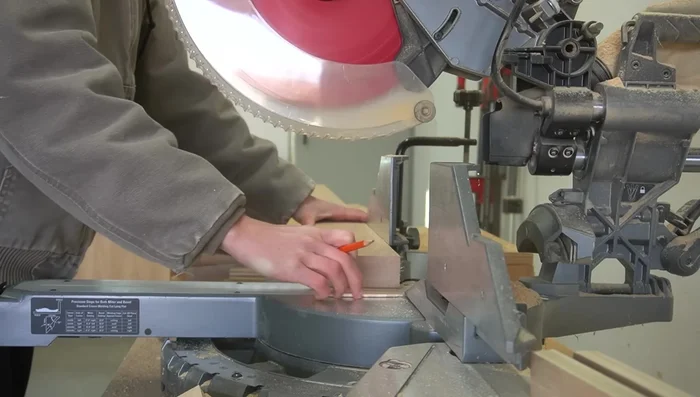 Build Headboard and Footboard Frames: Cut red oak 2x4s for sides and one for top. Drill dowel holes. Assemble frames using dowel pins and glue.