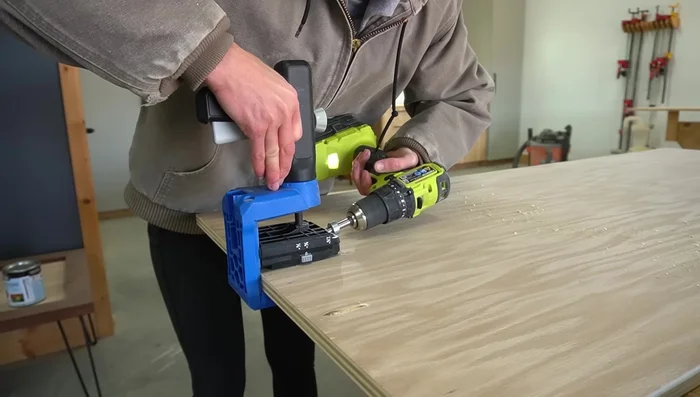 Attach Panels to Headboard and Footboard: Cut 3/4 inch plywood panels precisely. Attach to frames using pocket holes and screws.