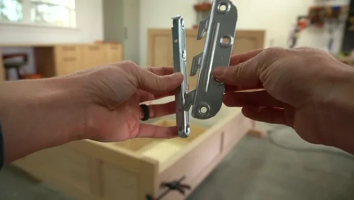 Assemble the Bed: Use bed brackets to attach side rails to headboard and footboard. Add a removable support block for the drawer frame.