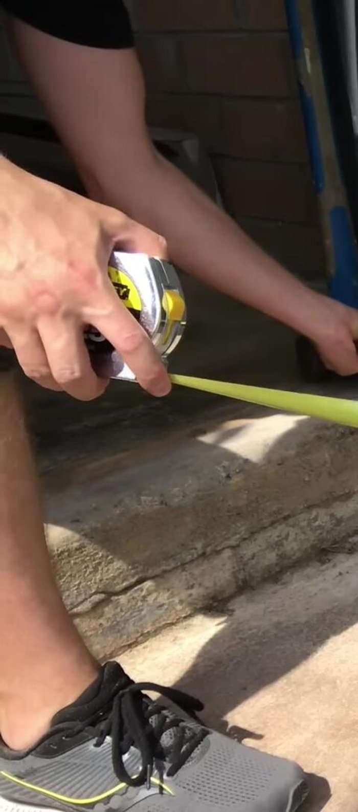 Make a straight line at the mark with the combo square and carefully cut the aluminum with a hacksaw.