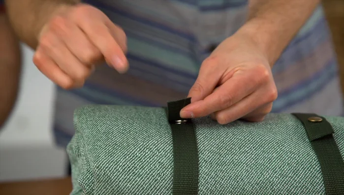 Seal the frayed ends of the straps with a lighter or decorative brass details.