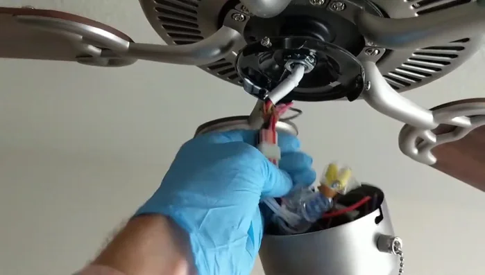 Unplug the ceiling fan's wiring harness.