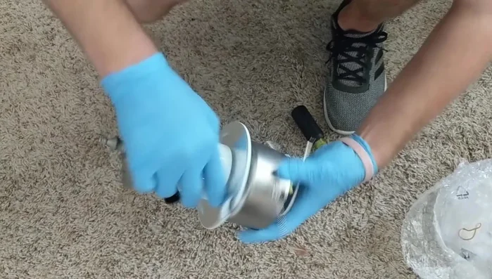 Tuck the wires neatly inside the housing and secure the light kit.