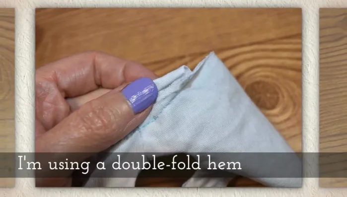 Fold the shirt at the shoulder seam and stitch from the sleeve hem to the underarm, then from the underarm to 1cm shy of the hem. Repeat on both sides.