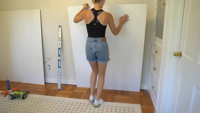 Repeat step 4 for subsequent beadboard panels, ensuring the seams align for a seamless look. If necessary, notch out for outlets before installation.