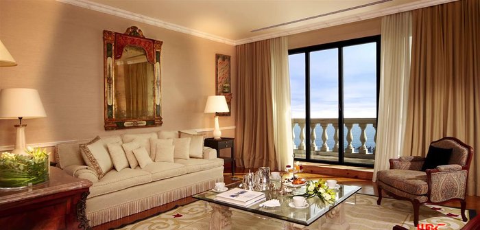 Strategically place mirrors to reflect light and enlarge the room.