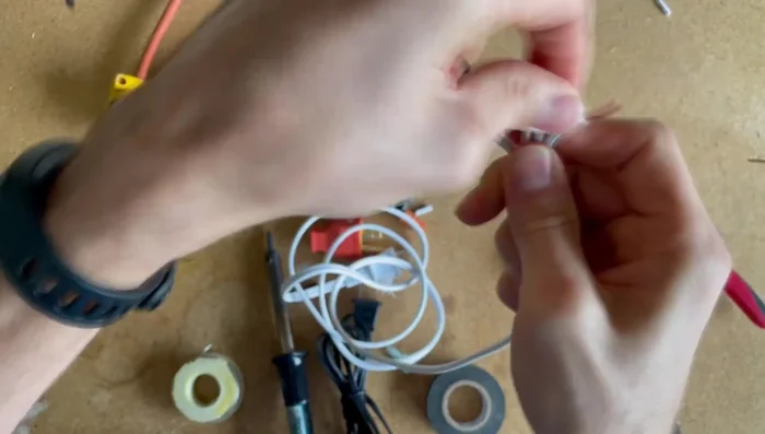 Twist the wires together securely.