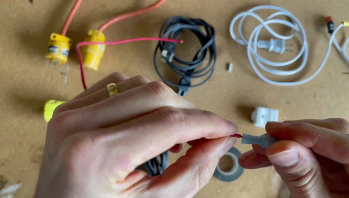 Insert the wires into the crimp connectors.