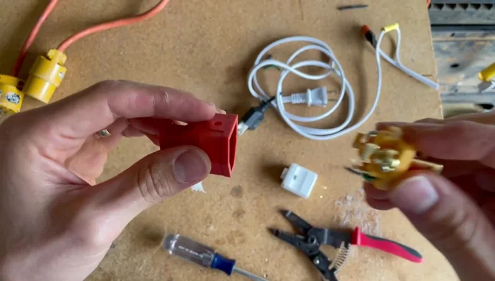 Connect the wires to the correct terminals of the retrofit plug (ground to green, neutral to silver/nickel, hot to brass/copper).