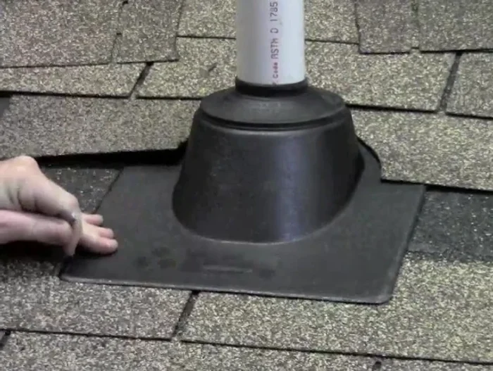 Seal the collar: Apply roofing compound over the nails and any gaps to ensure a waterproof seal.