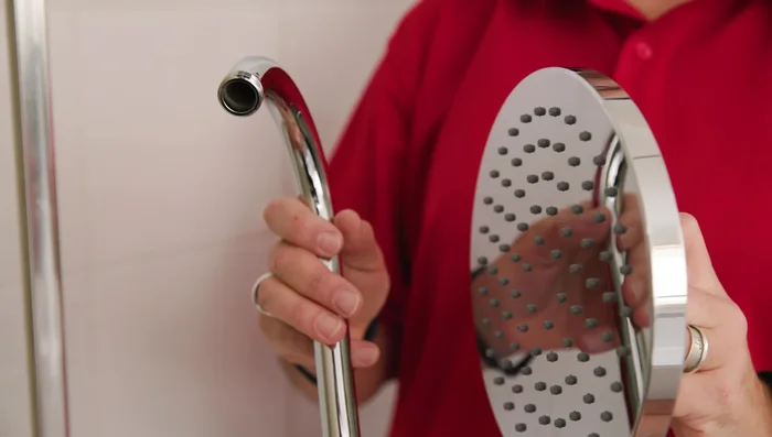 Install the new shower head by attaching it to the shower arm and turning it clockwise until hand-tight. Use a wrench if needed, but avoid overtightening.