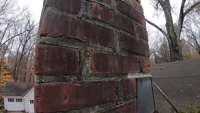 Inspect the chimney for cracks or damaged areas. These are common entry points for water.