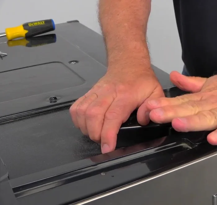 Remove the duct tape, plug the refrigerator back in, and verify that it is cooling properly.