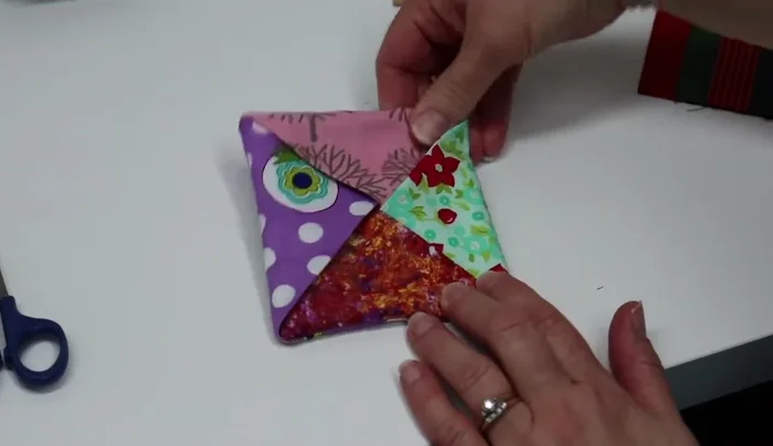 Press the coaster to flatten and finalize.