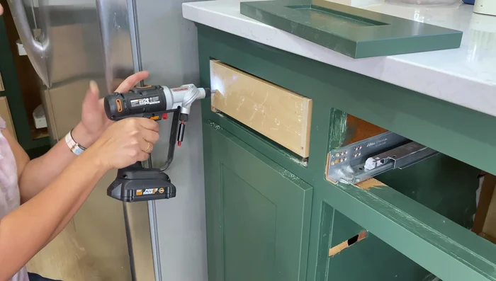 Install new drawer fronts; use temporary screws to hold in place while attaching from the inside. Use a Kreg Jig (optional) for accurate hardware placement.