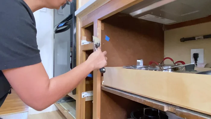 Fill screw holes with wood filler.