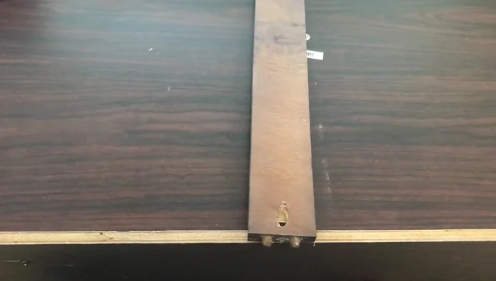 Attach the bottom piece of the drawer and secure it using screws or glue.