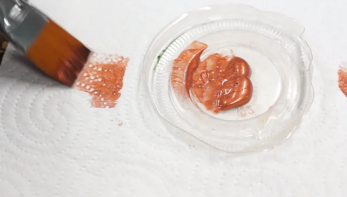 Apply a satin clear coat to seal the finish.