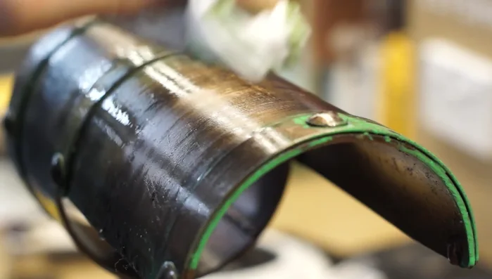 Apply a satin clear coat to seal the finish.