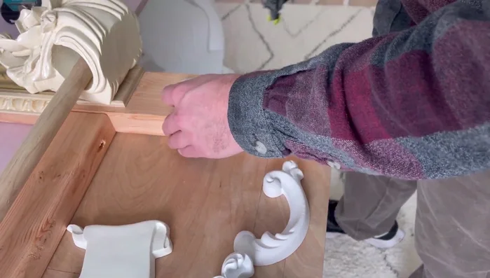 Nail on the onlays and rosettes.