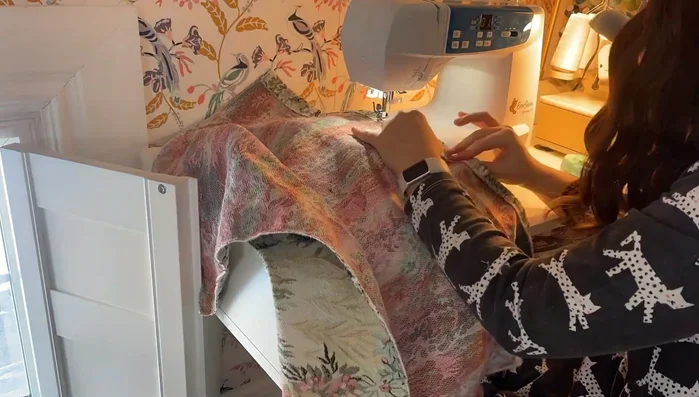 Create the backdrop from the pillow sham; sew a pull pocket and attach a wood dowel.