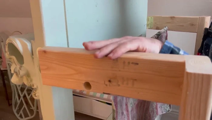 Upholster the side supports with fabric and staple/glue in place.