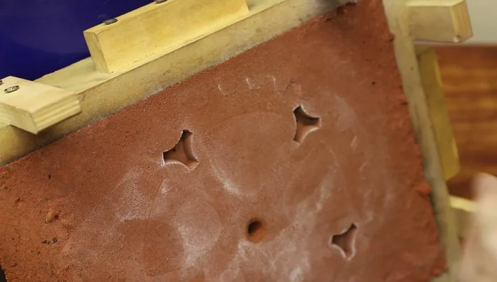 Create sprue and vent holes in the mold.