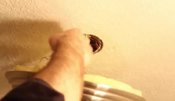 Push all wires into the junction box.